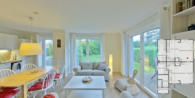 Wohnzimmer beim Bücherregal - Seehaus - Massives Einfamilienhaus am Breeger Bodden, nahe der Ostsee. Aktuell als Ferienhaus genutzt.