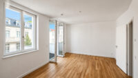 04_Wohnzimmer_mit_Loggiazugang_ARGUS