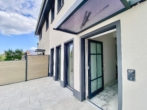 Eingangsbereich Haus F, Terrasse - Erstbezug – Ihr Familienidyll mit Terrasse, kleinem Garten, 2 Bädern & Stellplätzen