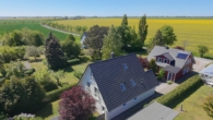 Aufblick beide Häuser - Zwei nordische Schwedenhäuser inkl. Saunahaus zur Eigennutzung oder Ferienvermietung