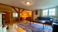 Wohnzimmer Perspektive 1 - Großes Baulandgrundstück mit liebevoll restauriertem Fachwerkhaus