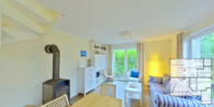 Wohnzimmer - Petterson - Charmantes rotes Ferienhaus im skandinavischen Stil- traumhafte Lage am Breeger Bodden nahe der Ostsee