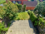 Terrasse - Blick vom OG - Bezugsfreies Familienidyll – vollunterkellertes Reihenhaus mit kleinem Garten