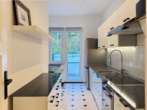 Küche mit Zugang zum hofseitigen Balkon - Wasserblick – Erstbezug nach Renovierung – 2 Balkone -möbliert