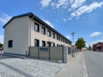 moderner Neubau - Ihr neues Zuhause für die Familie - Erstbezug: Modernes Reihenhaus mit 2 Bädern, Vorgarten, Stellplätzen & großem Gemeinschaftshof