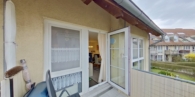 Balkon Blick in das Wohnzimmer - Ihre Altersvorsorge – vermietete Wohnung mit Süd-West-Balkon & Stellplatz