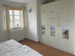 Elternschlafzimmer 1. OG - provisionsfreie Ferienwohnung nahe Strand – direkt vom Eigentümer